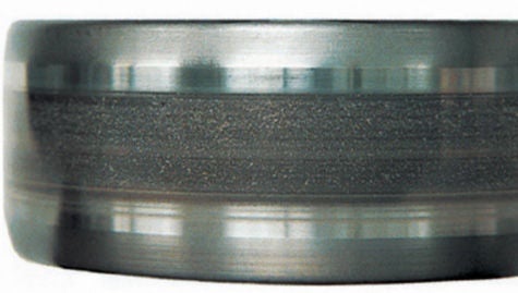 Dark belt of electrical erosion and pits on a CRB inner ring.