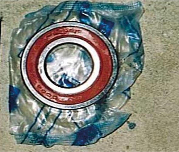 A counterfeit NSK bearing removed from its packaging